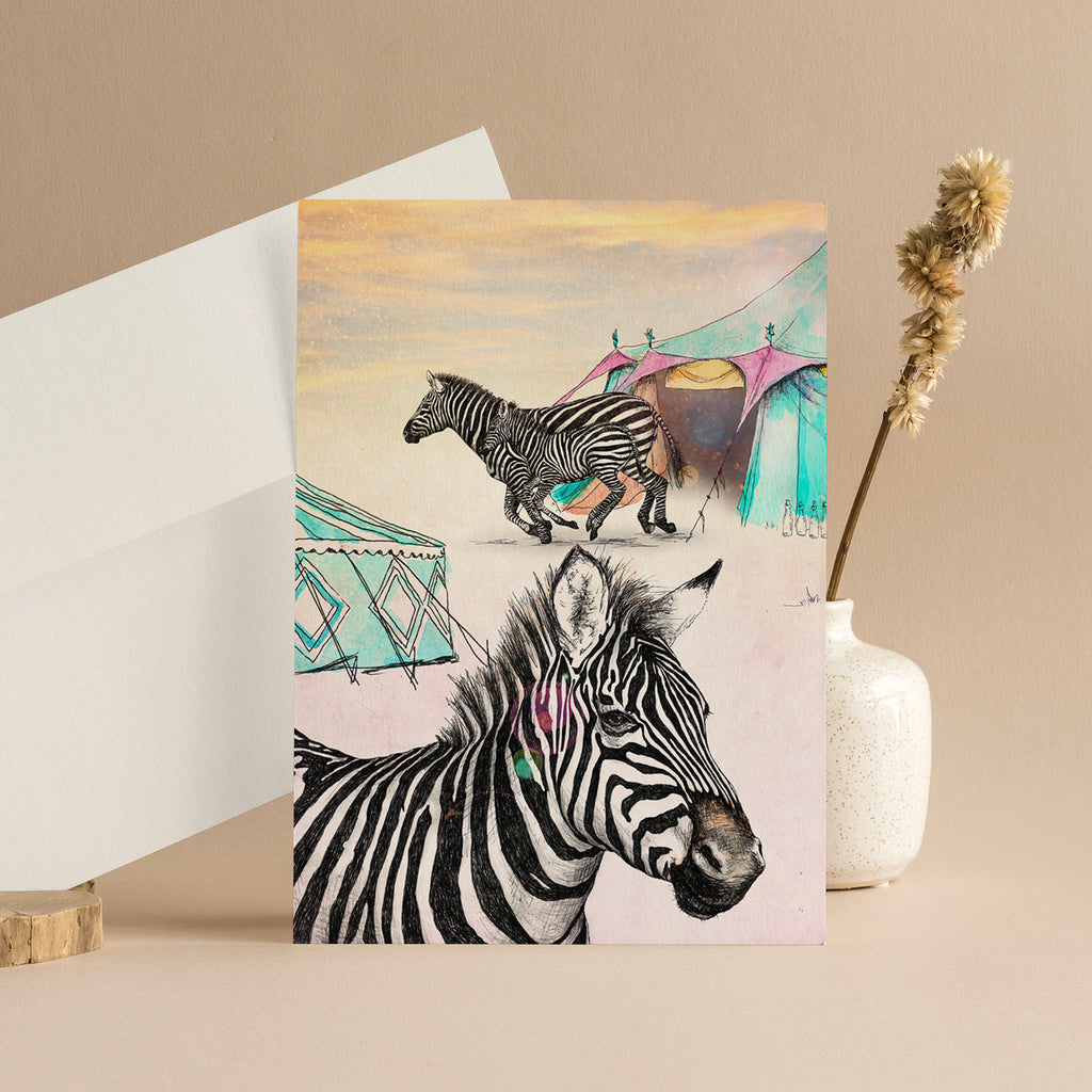 Card design and white envelope featuring detailed illustrations of Zebras fleeing a life of performing on demand.